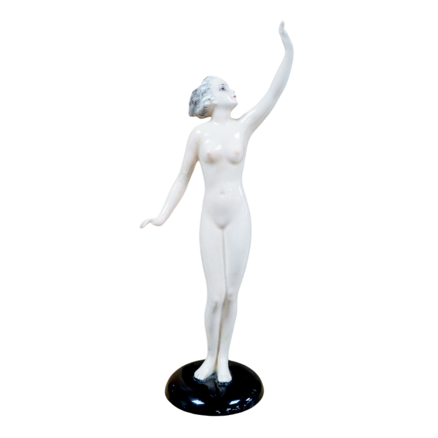 An Art Deco figural nude woman by Goebel, Oeslau Wilhelmsfield, 30cm high. Condition - restored